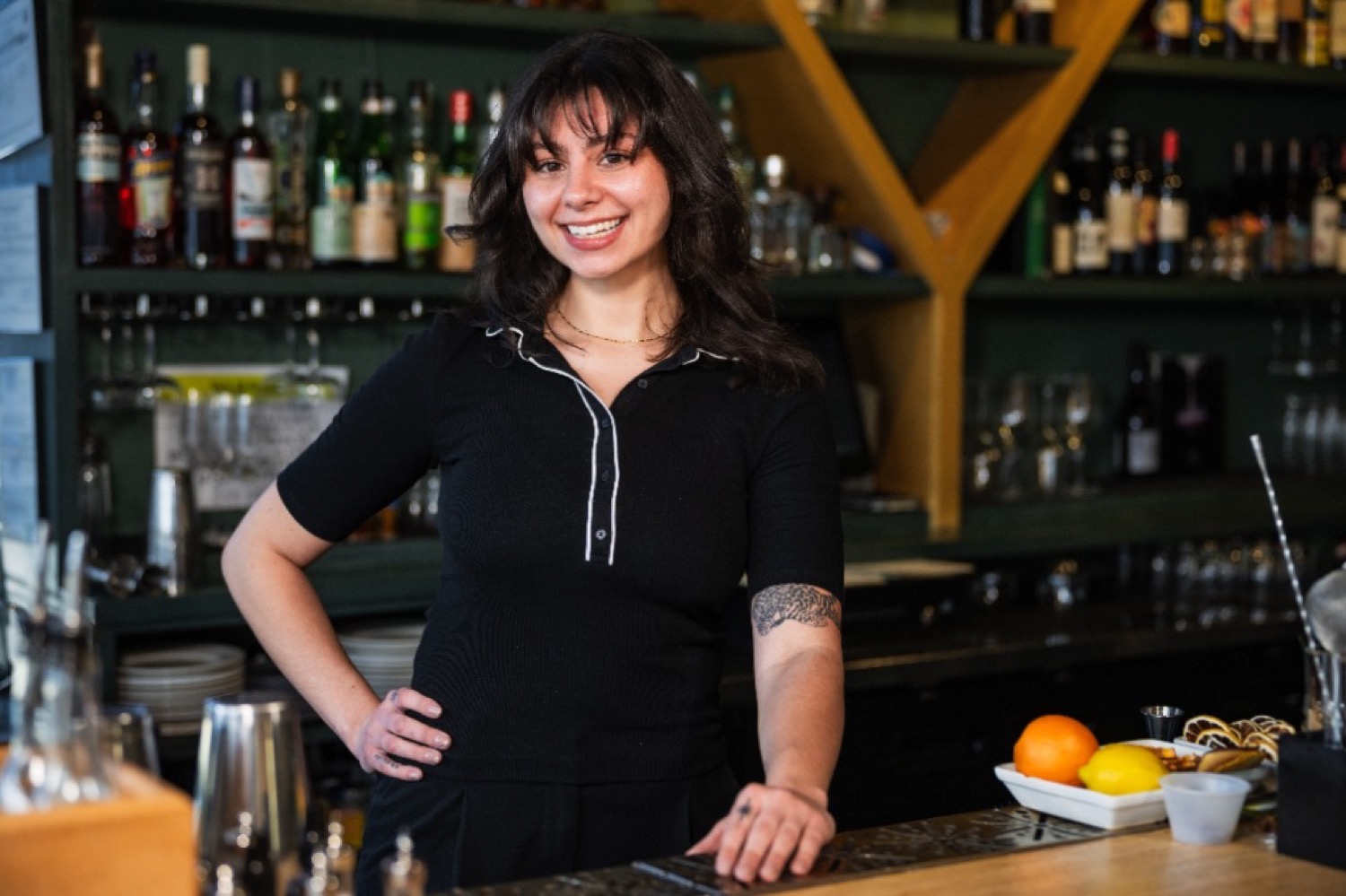 Meridan Tapert behind the bar